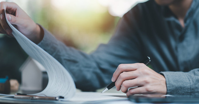 Agent reviewing insurance coverage